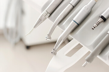Dental equipment in the dentist's office. Close-up of a modern dentist tools, burnishers with blurred background