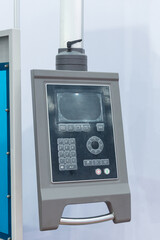 Sheet metal bending machine in factory.