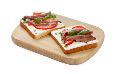Delicious sandwiches with cream cheese, anchovies, tomatoes and basil on white background