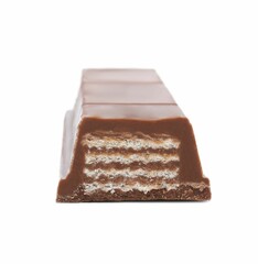Piece of sweet tasty chocolate bar on white background