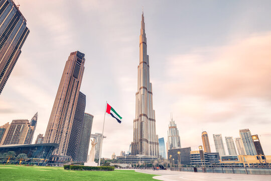 18 January 2023, Dubai, UAE: Scenic view of Dubai skyline, with the Burj Khalifa towering over all other buildings and motion blur of flying clouds. Sightseeing and travel destinations