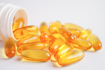 Fish oil or Cod liver oil gel in capsules with omega 3 vitamins, supplementary healthy food