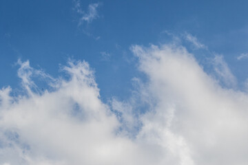Cloudscape in blue and white with copy space for background use