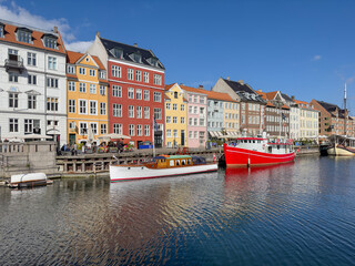 Nyhavn  old boats -Walking along Copenhagen's canals on a beautiful spring day, Denmark, Europe