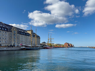 Naklejka premium Old wooden boats - Walking along Copenhagen's canals on a beautiful spring day, Denmark, Europe