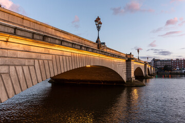 Beautiful view to old historic Putney bridge over Thames River