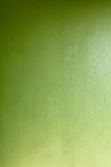 Green wall texture. Green paint on the wall. Abstract background for design
