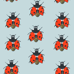 Seamless pattern with red ladybugs on blue background