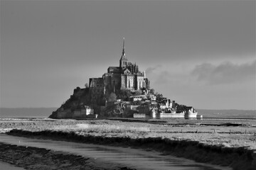 black and white picture of a historical village in France