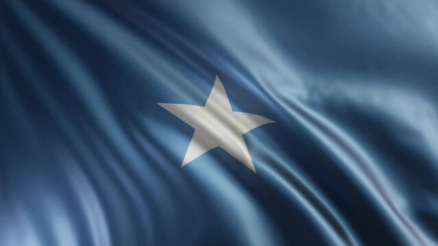 The Somali flag flutters in the wind close-up, the national flag of Somalia flutter in 3d, in 4k resolution. High quality 4k