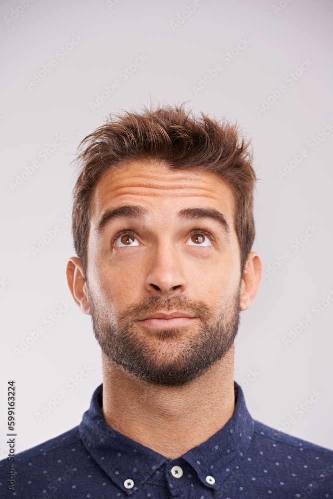Poster thinking, looking up and man in studio with solution, ideas and relax with eyes and mockup. isolated