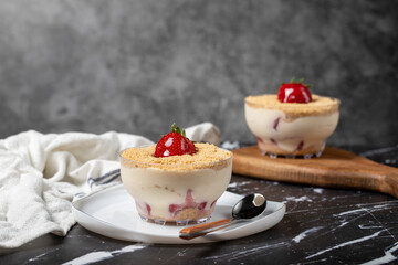Strawberry magnolia. Magnolia dessert in bowl with cream and strawberry
