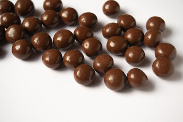 sweet chocolate balls on a white background
