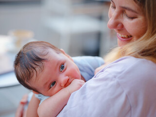 Diverse people portrait. Creative businesswoman balancing work and motherhood. Beautiful young...