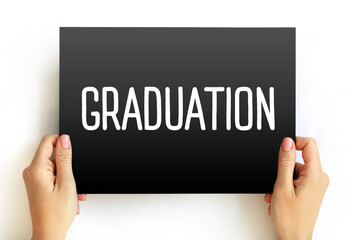 Graduation is the award of academic degree, text concept on card