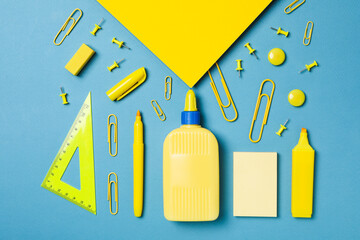 Concept of different office stationery with glue