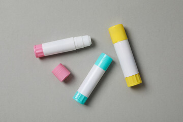 Concept of different office stationery with glue