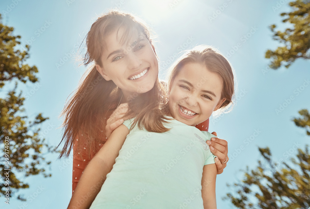 Wall mural Cant be indoors on a beautiful day like this. Portrait of a mother and her little daughter bonding together outdoors.