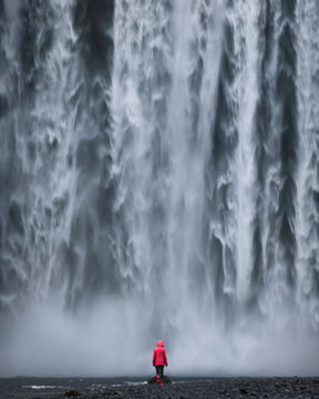 Women in front of Skogafoss waterfall at south Iceland