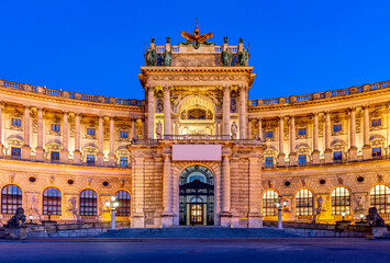Fototapeta na wymiar Hofburg palace on Heldenplatz square at night, Vienna, Austria
