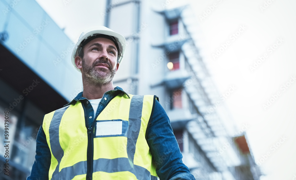 Aufkleber Its time to implement that vision. a engineer standing in front of a building.