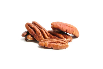 Peeled pecan nuts isolated on a white background. Heap of pecan halves