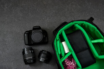 Professional Photography Gear : camera and lenses, blue wireless on grunge gray background