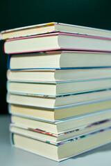 Stack of books on dark backgrounds, World book day