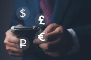 Businessman using mobile phone with currency icon, currency exchange.
