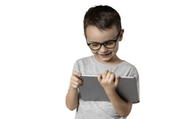 Happy child boy  holding a tablet on png background