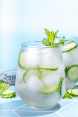 Two glass with cucumber water