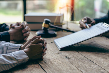 Businessmen and lawyers meeting to discuss contract documents sitting at table Legal concept. Advice. Injustice legal service in a lawyer office.