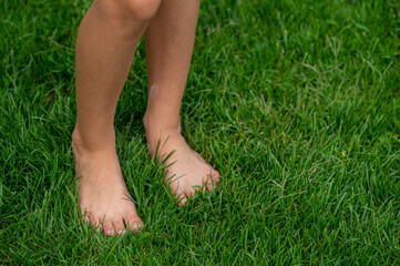 Bare feet on the grass