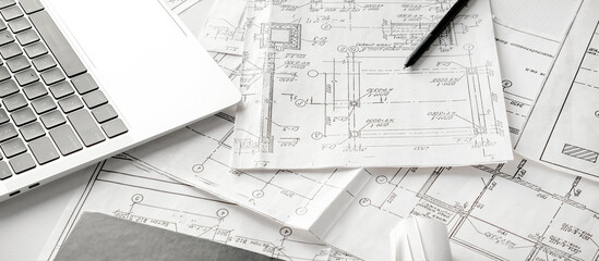 Architects concept, engineer architect designer freelance work on start-up project drawing, construction plan. architect design working drawing sketch plans blueprints and making construction model