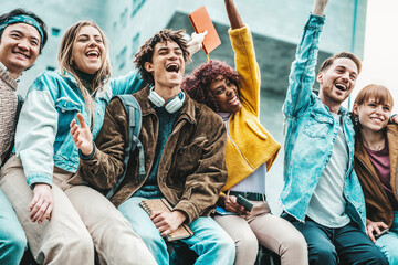 International university students celebrating together end of school - Happy young people hanging outside - Friendship concept with guys and girls enjoying time together after school