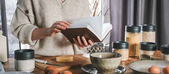 girl is preparing food dinner in the kitchen of her cozy home.home cooking, at home dining Slow cooking, comfort, mood. Slow moments of life, wellness and self love