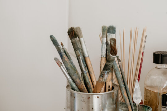 Paintbrushes in an art studio.