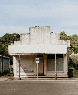 Old shop with one way sign.