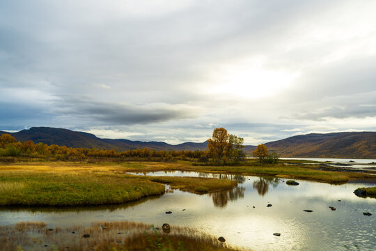 Grunnvågvatn is a beautiful nature reserve, lakes and trees in their autumnal colores, in Troms og Finnmark, Norway