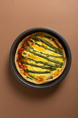 Top view of asparagus quiche in pan food homemade