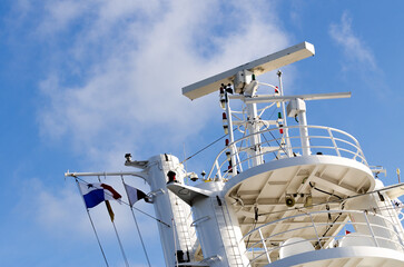 Control navigation radar set of antennas cruise ship. Radars on the top cruise liner deck blue view...