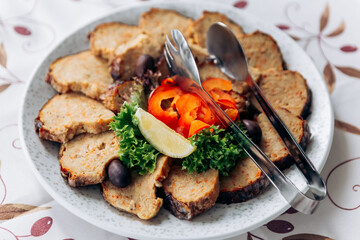 Served table food buffet in restaurant for wedding or birthday party dinner dishes. Assorted meats, chives with mould and herbs

