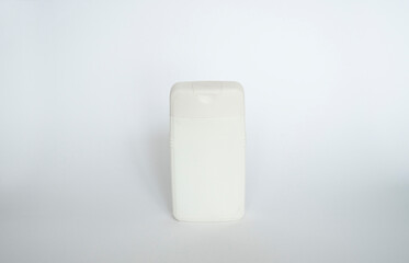 White unbranded dispenser shampoo, gel, soap bottle isolated on white background. Cosmetic packaging mockup with copy space.