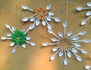 Recycled materials, such as plastic spoons, upcycling spoon Images are being used for home decoration.