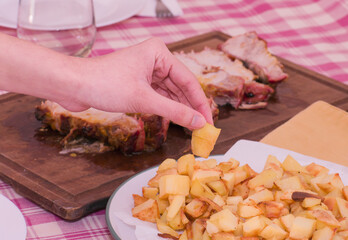 Young teenager takes baked potato