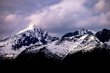 Fototapeta na wymiar Cloudy winter landscape of the Tatra Mountains. Mount Krivan.