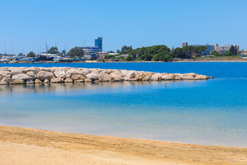 Fototapeta na wymiar Blue lagoon and sandy beach . Limassol Cyprus seaside 