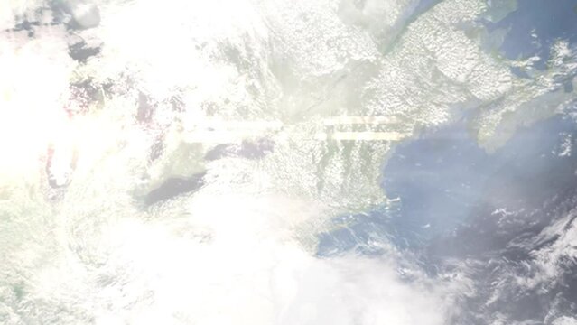 Earth zoom in from outer space to city. Zooming on Rome, New York, USA. The animation continues by zoom out through clouds and atmosphere into space. Images from NASA