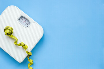 Check your body shape with weight scales and tape measure