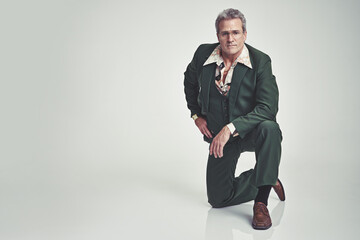 I did not have a sexual relationship with that lady. Studio shot of a mature man in a retro suit...